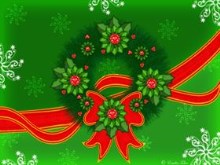 Christmas wreath on green background